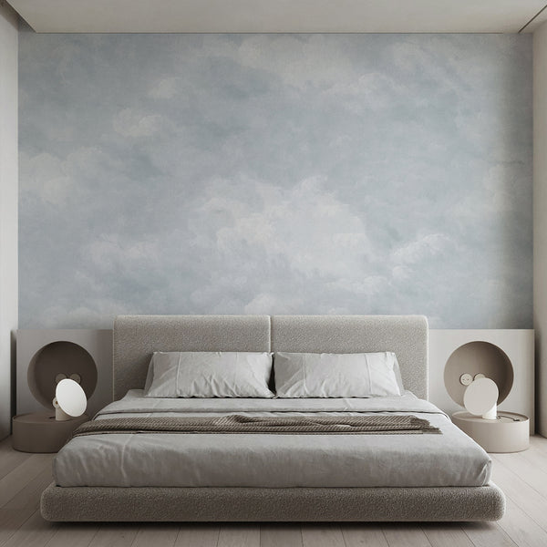 Dreamy cloud wallpaper in pale blue and white tones with soft watercolor details, designed for a serene nursery, bedroom, or minimalist interior.