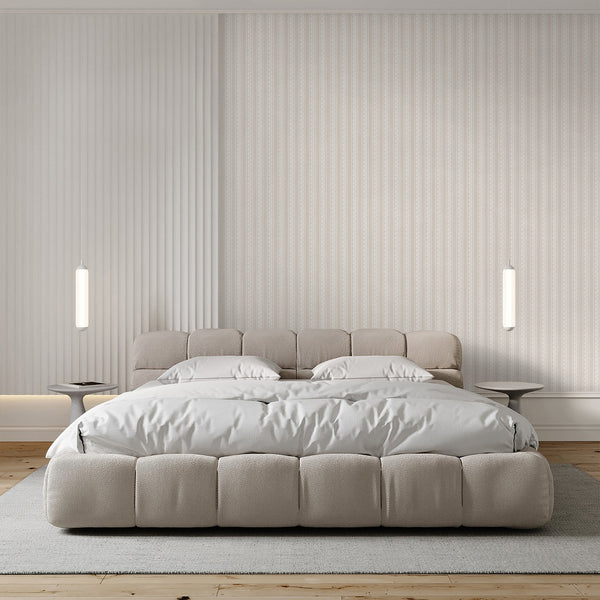 Neutral beige botanical wallpaper featuring vertical floral stripes and playful white wavy lines, ideal for a calm nursery, bedroom, or accent wall.