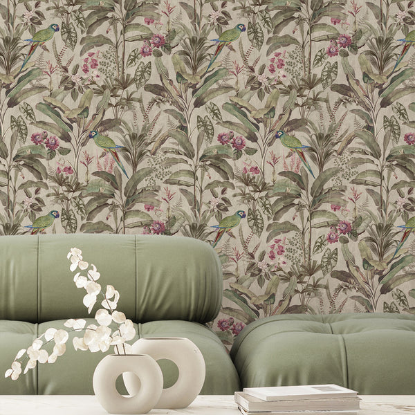 Vintage botanical wallpaper featuring green parrots among lush tropical foliage, muted pink flowers and palms against a warm neutral background.