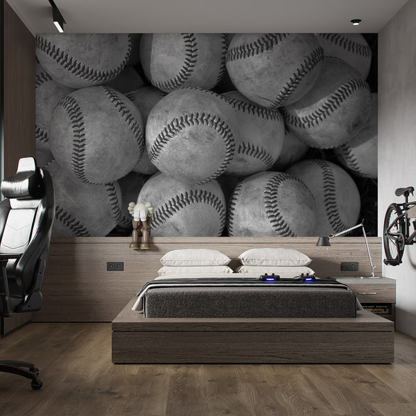 Sports wallpaper featuring realistic monochrome baseballs with dark stitched seams and distressed texture for a game room or bedroom accent wall.