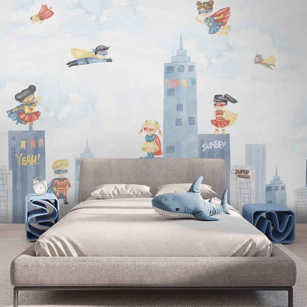 Comic city wallpaper with superhero boys and girls standing on rooftops and flying through pale blue clouds above a soft watercolor skyline.
