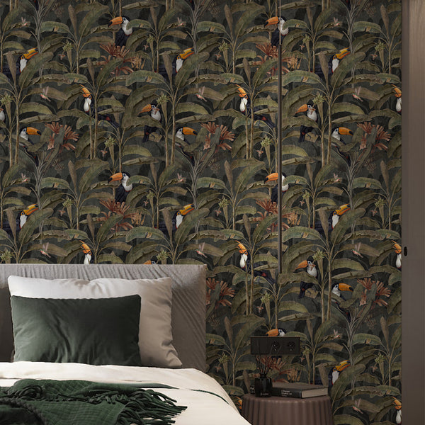 Exotic rainforest wall mural with toucans, delicate hummingbirds, olive green tropical leaves and rusty red plants on a deep charcoal green background.