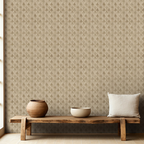 Ornate beige damask wallpaper with antique gold botanical details and a softly distressed texture for a vintage bedroom, dining room or living room.