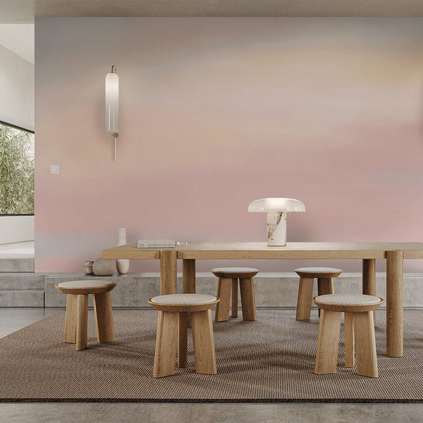 Pink and blue watercolor wallpaper featuring subtle blended pastel colors and a cloudlike abstract effect for a nursery, bedroom or relaxing accent wall.