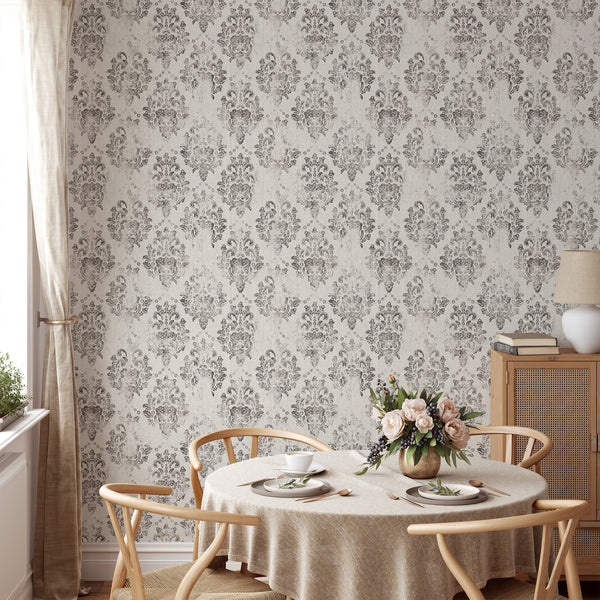 Charcoal medallion motifs on warm gray, creating a vintage damask pattern. This wallpaper suits a bedroom or formal dining area, offering elegant structure and a subtle distressed look for traditional interiors.