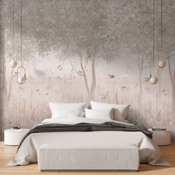 Beige forest wall mural with delicate flowering trees, flying birds and a meadow of wildflowers in a soft neutral botanical landscape.
