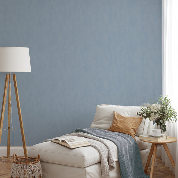 Eco-friendly wall mural with a dusty blue limewash effect, offering a serene backdrop for Japandi-inspired rooms.