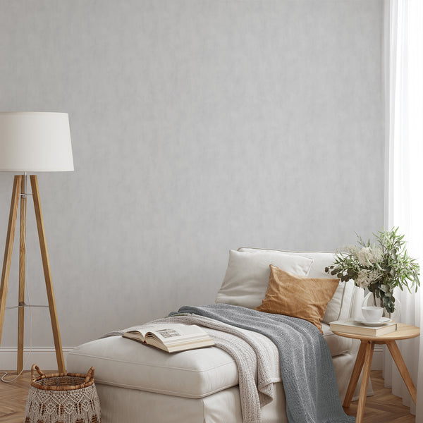 Eco-friendly plaster look wallpaper with subtle tonal shifts, perfect for a modern accent wall in any home.