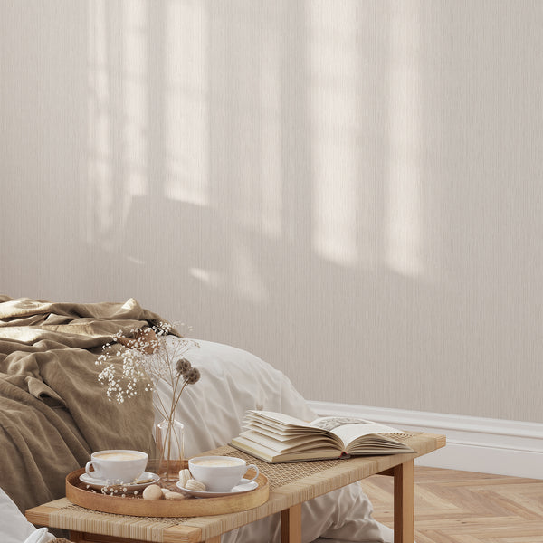Consistent vertical striations in neutral beige tones, offering a calm backdrop for contemporary or minimalist rooms.