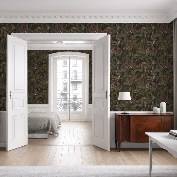 Vintage jungle wallpaper with golden spotted leopards, muted green tropical foliage and colorful birds on a deep charcoal green background.