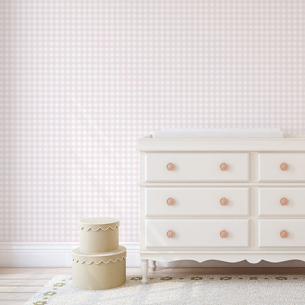 Farmhouse checkered wallpaper in pale pink and white with delicate linear texture for a cozy baby girl nursery or bedroom accent wall.