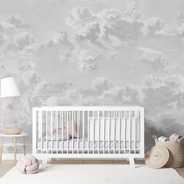 Gray sky wallpaper with soft billowing clouds and subtle neutral shading, creating a dreamy atmospheric backdrop for bedroom and nursery decor.