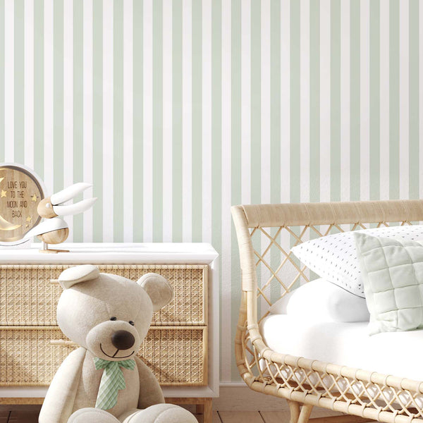 Sage green striped wallpaper with narrow, evenly spaced vertical bands that provide a subtle, orderly aesthetic. Ideal for accent walls in nurseries and hallways, this self-adhesive wallpaper is easy to reposition and remove. Made in the USA with eco-friendly materials, it brings a crisp, matte finish to any interior design project.