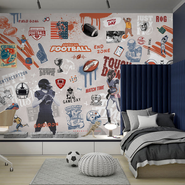 American Football Graffiti Wall Mural with layered imagery of players, helmets, and bold text like 'Touchdown,' perfect for a sports-themed teen bedroom or playroom. This removable wallpaper features rust orange, navy blue, and black tones with paint drips, creating a dynamic and modern industrial style.