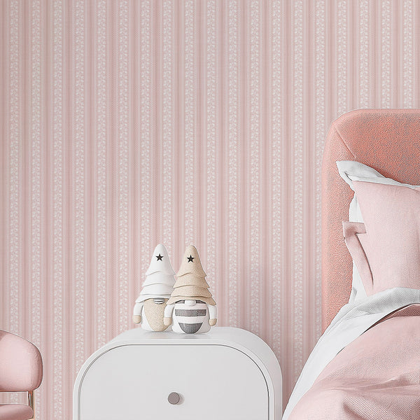 Farmhouse floral wallpaper with warm pink vertical stripes, white botanical illustrations, and a vintage-inspired pattern for nursery or bedroom walls.