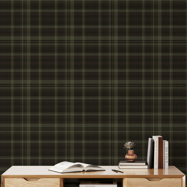 Rustic checkered wallpaper featuring deep olive green, nearly black, and muted brown tones arranged in a classic vintage-inspired plaid design.