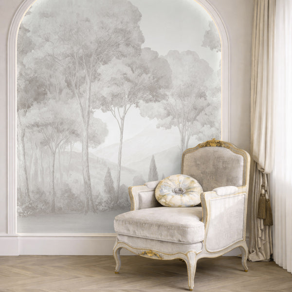 Neutral misty forest wallpaper with desaturated gray washes, offering a calm bedroom backdrop. This eco-friendly, removable mural is ideal for those seeking a modern Scandinavian design.