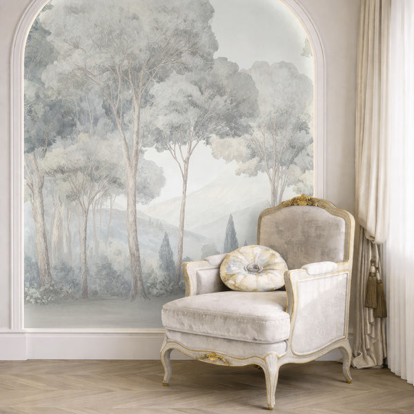 Soft misty forest wall mural with slender trees receding into foggy hills, creating a calming bedroom backdrop. This removable wallpaper uses eco-friendly materials and is ideal for modern organic decor.