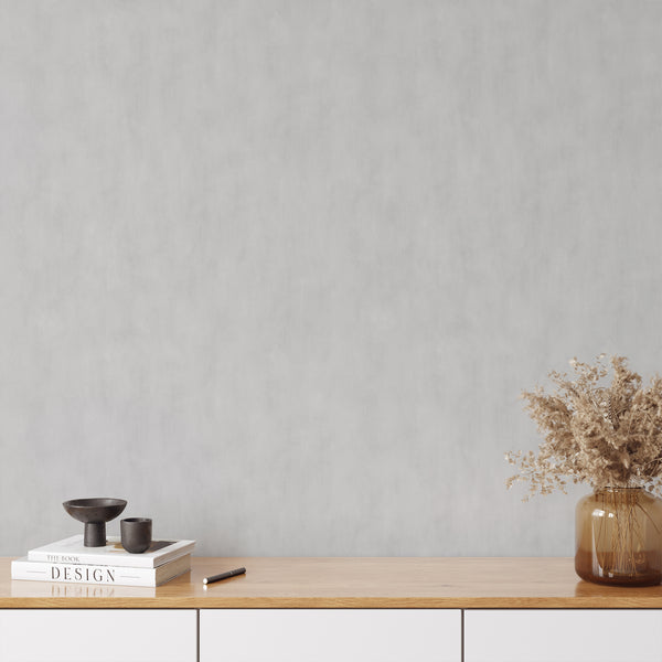 Peel and stick wallpaper with light gray plaster finish, easy to apply for a calm architectural backdrop.