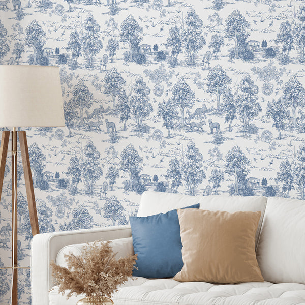 Blue French toile wallpaper with scenic vignettes of wildlife and architecture, providing classic country character for dining rooms or entryways. Made in the USA, this eco-friendly design is removable and perfect for traditional interiors.