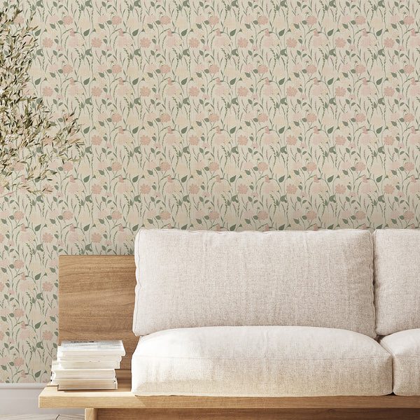 Floral wallpaper with muted sage green foliage and dusty pink flowers arranged across a warm neutral background for bedroom or nursery decor.