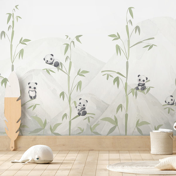 Watercolor panda wall mural featuring cute black and white pandas, soft green bamboo and misty neutral mountains for a peaceful nursery or kids room.