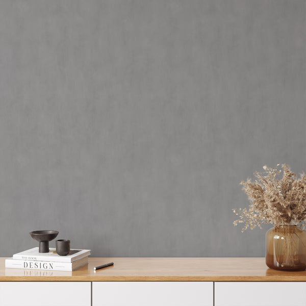 Chic Gray Plaster Look Wallpaper featuring a concrete-inspired backdrop with subtle tonal shifts. Suitable for minimalist bedrooms or home offices, this traditional unpasted wallpaper offers a matte appearance and eco-friendly materials, ideal for decorators.