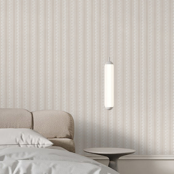 Beige floral stripe wallpaper with white hand-drawn flowers, wavy borders, and subtle texture for cottagecore nursery or farmhouse bedroom decor.