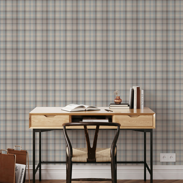 Cottagecore plaid wallpaper in muted dusty blue and warm beige with subtle brown accents, featuring a textured-looking zigzag check pattern.