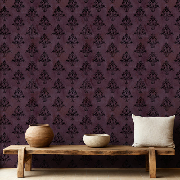 Black floral damask pattern over a deep dusty purple background with distressed texture, ideal for moody bedrooms, dining rooms and powder rooms.