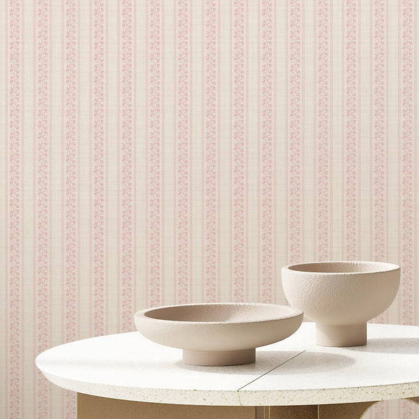 Farmhouse wallpaper with blush pink floral vines, slim wavy stripe borders, and a timeless botanical pattern for French country inspired interiors.