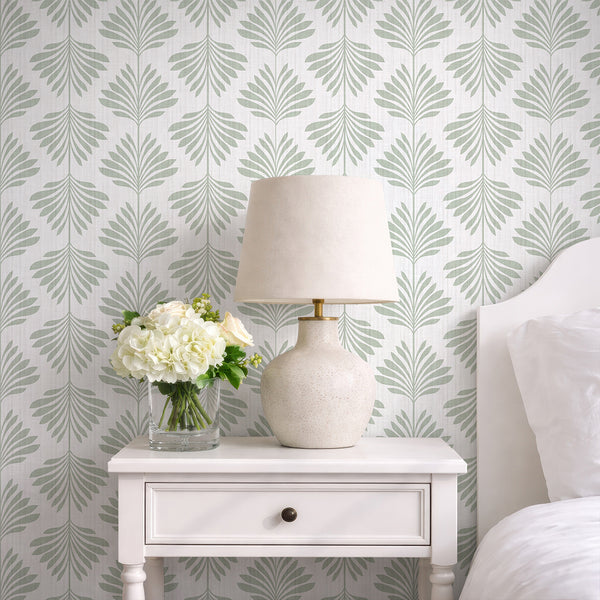 Featuring stacked palm fronds in sage green, this wallpaper adds height and order to living rooms and entryways. Its traditional unpasted design is Made in the USA, ideal for renters looking for easy-to-apply modern wallpaper options.