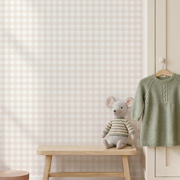 Warm beige tartan wallpaper featuring layered stripes and checkered details on white, ideal for a neutral nursery, bedroom, or modern accent wall.