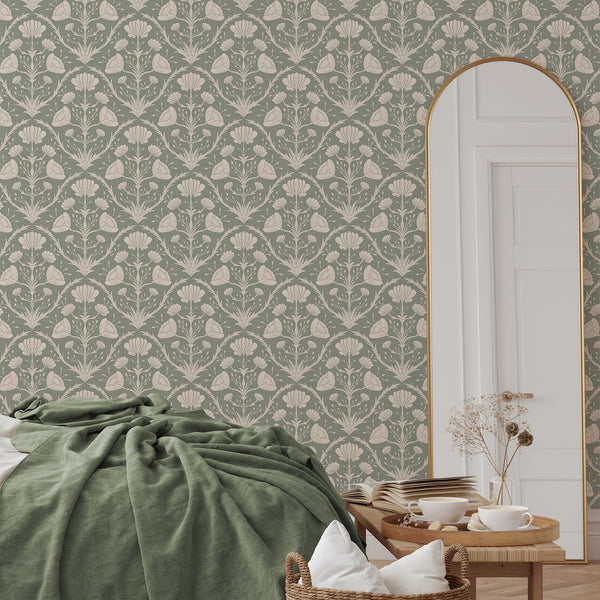 Muted sage wallpaper with mirrored floral rows, offering a classic botanical repeat for vintage interiors.