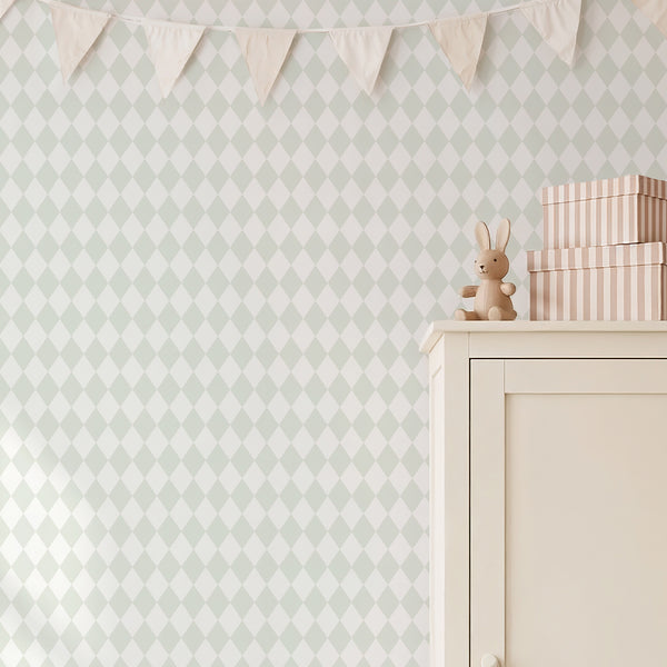 Mint-green geometric rhombus wallpaper designed to bring a soft, contemporary feel to any room. The pale diamonds create a fresh backdrop, suitable for bedrooms or nurseries. With eco-friendly materials and a removable design, this wall mural is ideal for those seeking temporary decor options.