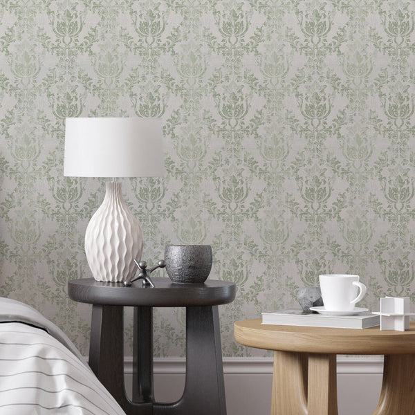 Detail of sage damask wallpaper on a taupe background, ideal for traditional interior design themes.