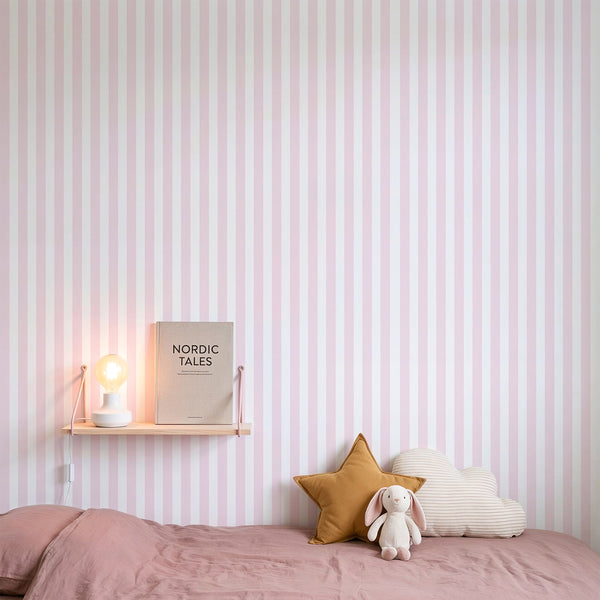 Light pink striped wallpaper with pale blush and off-white vertical bands, creating a tidy rhythm ideal for nurseries or kids' bedrooms. This self-adhesive wallpaper is removable and eco-friendly, perfect for modern and traditional interiors.