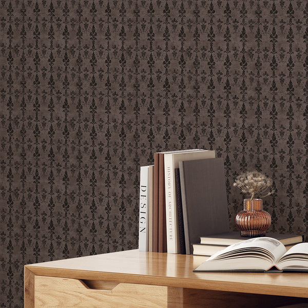 Brown damask wallpaper with a dense floral-foliate repeat, creating an antique, fabric-like appearance for classic bedrooms or hallways. The distressed background enhances the traditional decor style.