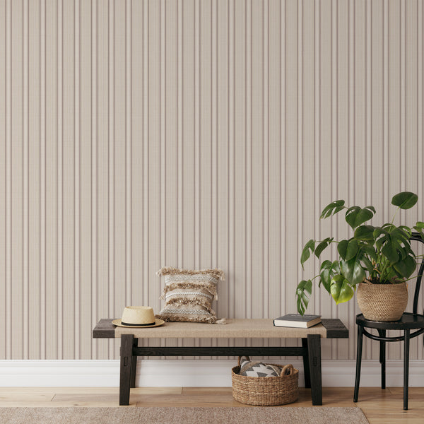 French country striped wallpaper featuring delicate brown vertical patterns on a cream beige background, perfect for classic cottage and farmhouse interiors.