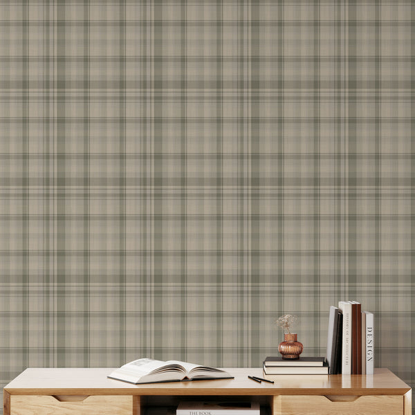 Vintage geometric wallpaper featuring a sage green and beige tartan pattern with soft earthy colors for a farmhouse bedroom or cozy home office.