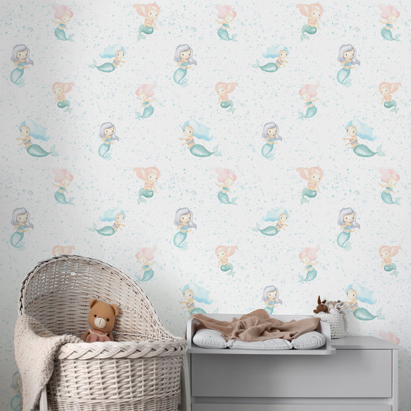 Blue mermaid nursery wallpaper featuring whimsical watercolor mermaids and translucent bubble dots on a white ground, perfect for a dreamy under-the-sea theme.