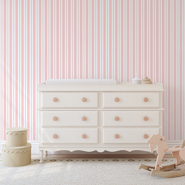 Soft rose and blush pink striped wallpaper with crisp geometric lines, perfect for creating a calm atmosphere in a child's bedroom or home office accent wall.
