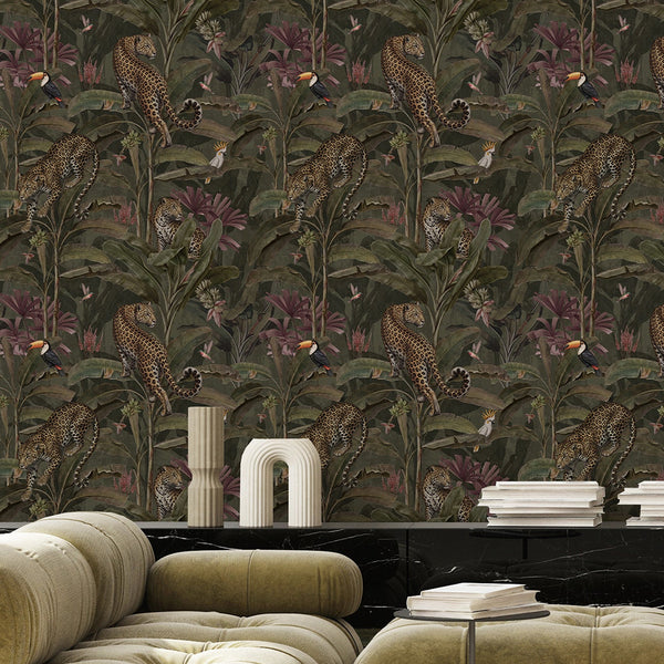 Maximalist jungle wallpaper featuring golden leopards, tropical toucans, delicate hummingbirds and deep green foliage for a bold dining room design.