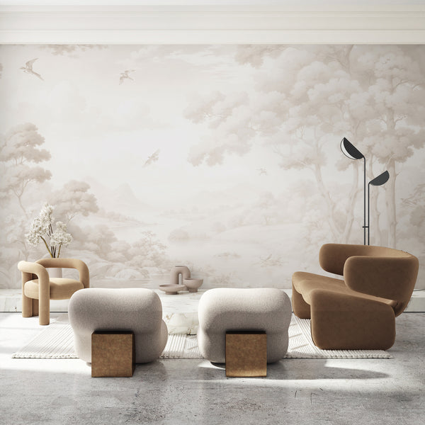 Beige vintage landscape wall mural featuring misty hills, a quiet river, and airy clouds, creating a serene backdrop in living rooms. The warm taupe tones and painterly quality complement classic and modern organic interiors.