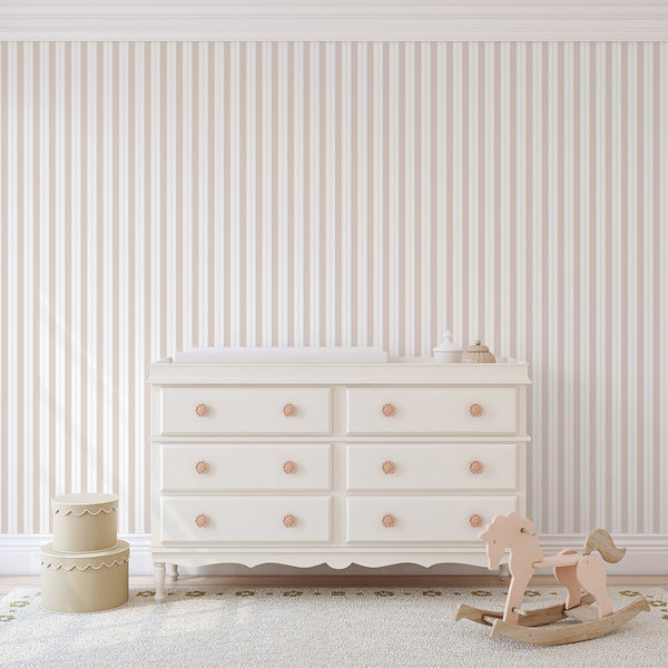 Pastel Beige Stripe wallpaper with a regimented vertical band pattern, adding height and warmth to rooms. The soft color palette is perfect for nurseries or hallways. This high-quality removable wallpaper is easy to apply, offering a temporary yet elegant design solution for modern interiors.