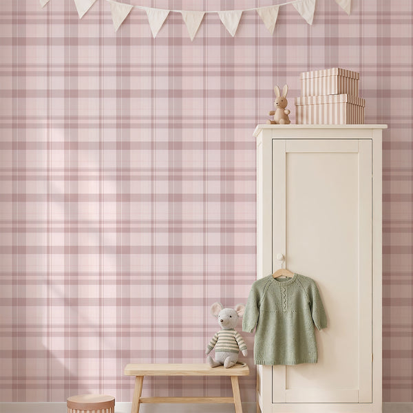 Charming pink plaid wallpaper with crosshatched tartan detail, adding a cozy and classic touch to a girl's room or modern cottage.