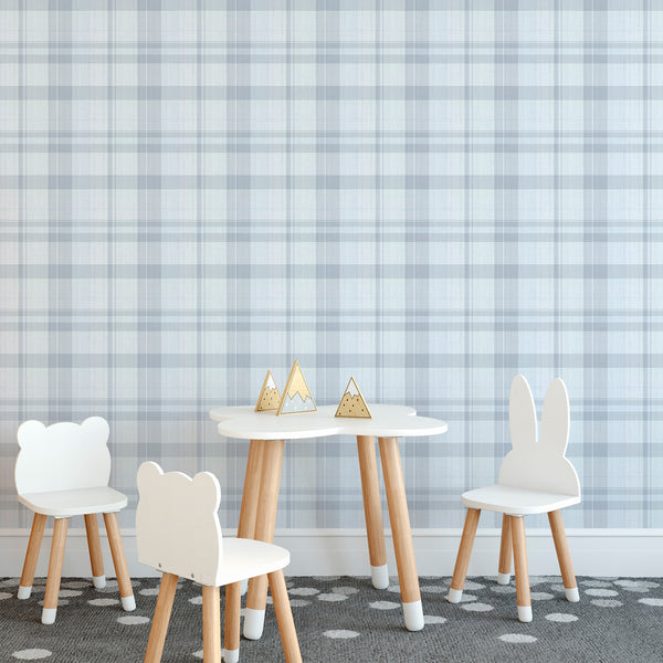 Removable peel and stick wallpaper with a blue plaid design, offering a cozy woven look for modern farmhouse nurseries. Eco-friendly and easy to apply.