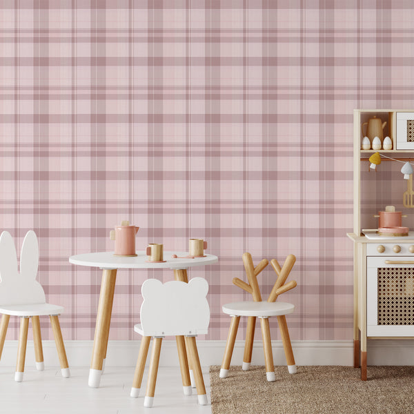 Cozy pink plaid wallpaper with a tartan grid design in dusty rose and mauve, ideal for a farmhouse-style nursery or bedroom.