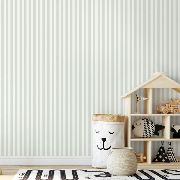Light green stripe wallpaper with precise vertical mint and off-white lines. Perfect for entryways, the wallpaper creates a directional field that complements neutral interiors. The traditional unpasted option allows for a customized installation.