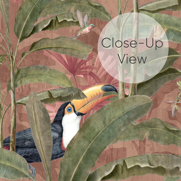 Close up of botanical bird wallpaper with detailed olive green foliage, orange-beaked toucans and soft dusty pink tropical plants for a vintage-inspired living room.